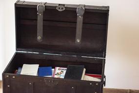 wooden chest of books