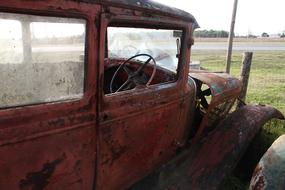 rusty car forgotten