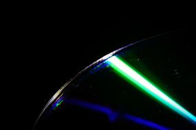 reflection of light on compact disk surface