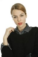 photo of a girl in a gray shirt and black sweater