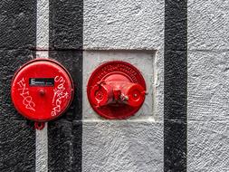 red pipes on the facade of the building
