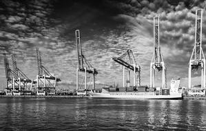 cranes on a ship at sea