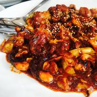 Rice with seafood in sauce