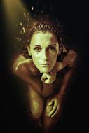 woman gold water eyes contrast