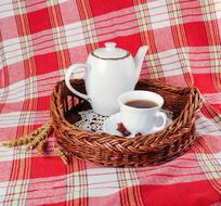 tea and teapot on a table of color