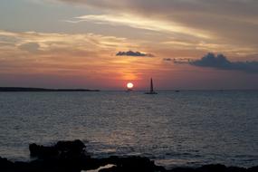 sunshine with sea and rocks landscape