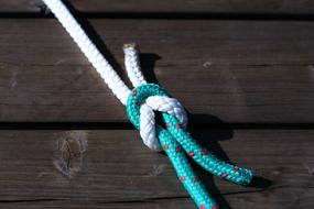 colored rope on a wooden table