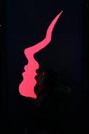 silhouette of a man's face in the dark