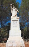 sculpture with an inscription in sunny israel