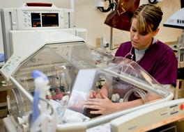 Nurse a newborn