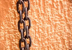 Rusty Chain at orange background