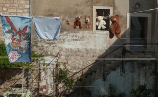 dry linen and teddy bears on a rope