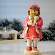 child girl in winter clothing, vintage figurine