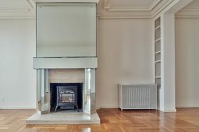 photo of fireplace in an empty room