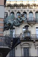 Beautiful and colorful dragon on the Casa Bruno Cuadros in Barcelona, Spain