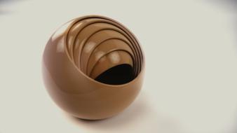 brown glossy round object