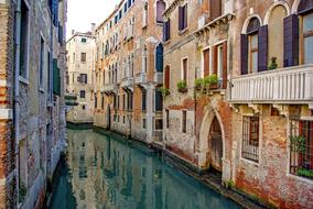 Venetian canal among buildings