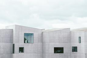 white building of a modern architecture with glass