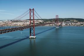 Bridge 25 April - suspension bridge connecting Lisbon on the north and Almada on the south bank of the Tagus River