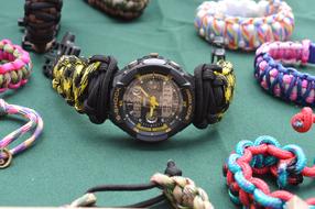 a colored wristwatch on the table