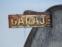 iron rusty sign on the wall