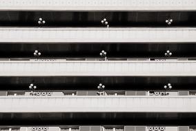 black and white photo of the facade of a multi-storey building in Barcelona, Spain