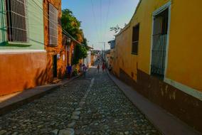 yellow and orange buildings on the streets in Cuba