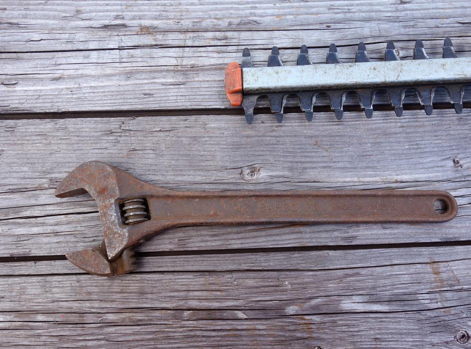 wrench and chainsaw