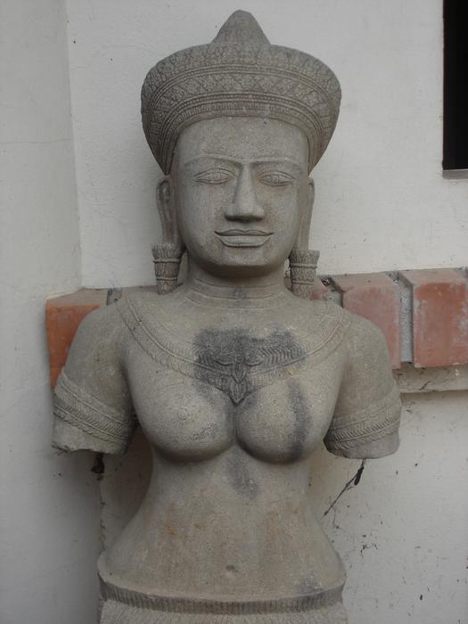 Buddhist stone torso statue