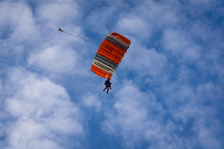 man on a parachute in the sky
