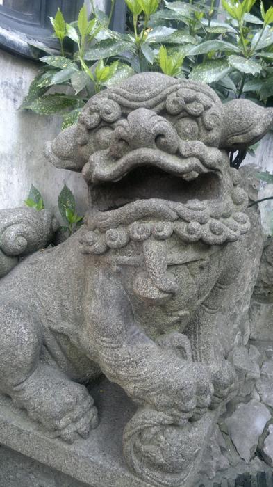 old gray statue