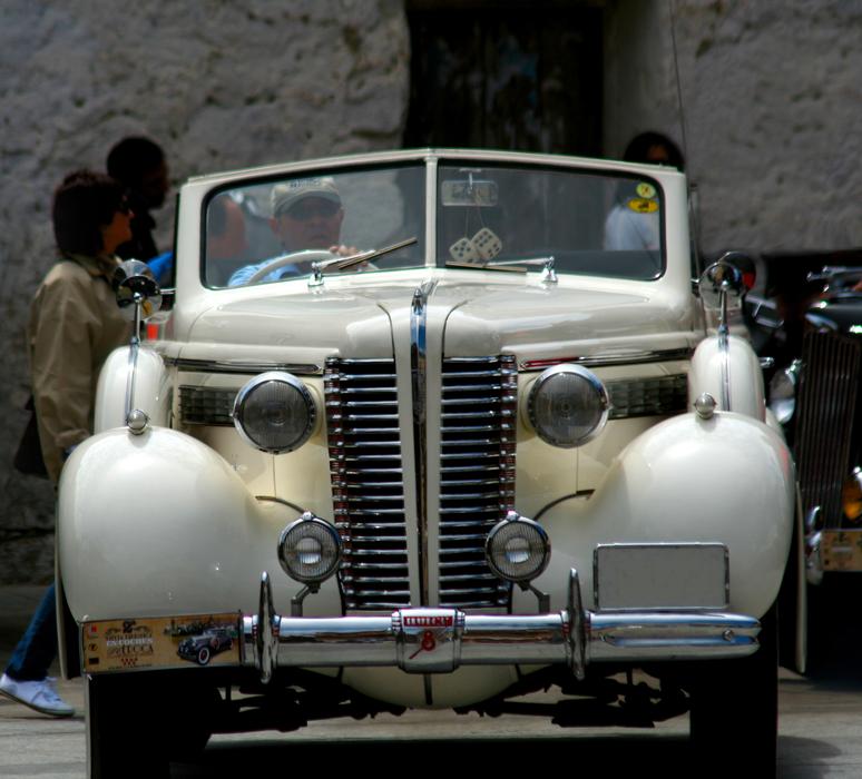 vintage white car driving