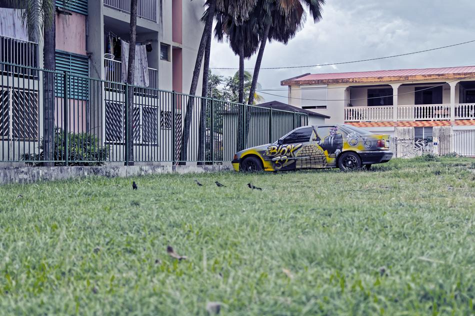car outside the houses