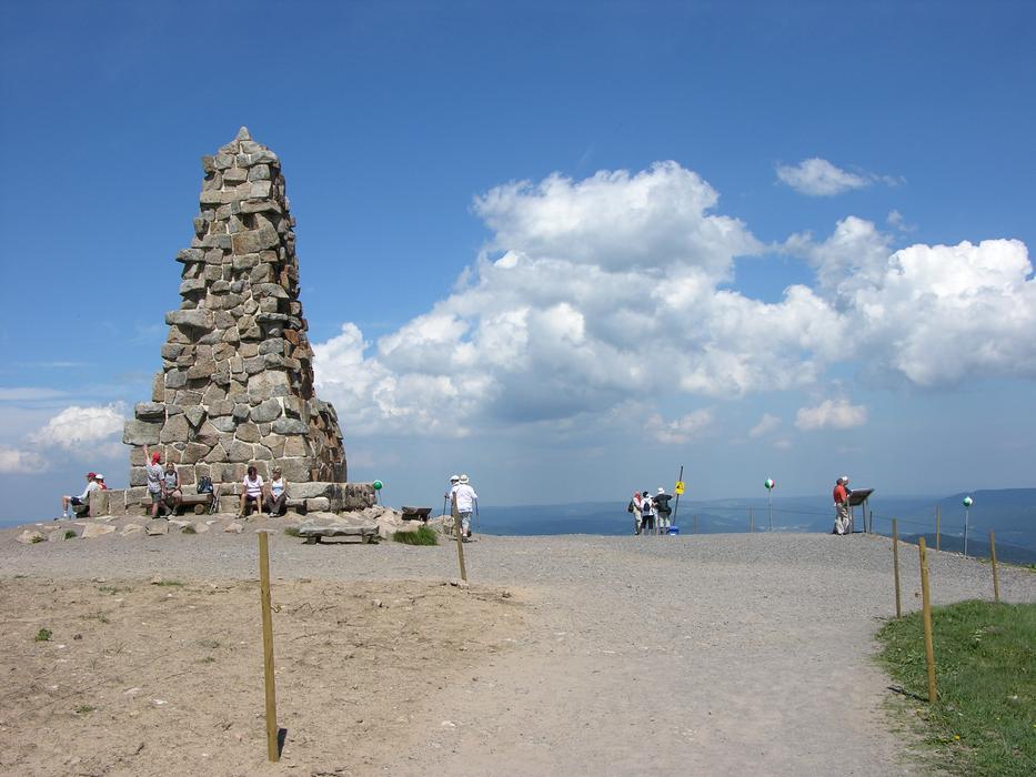 a stone pillar by the sea
