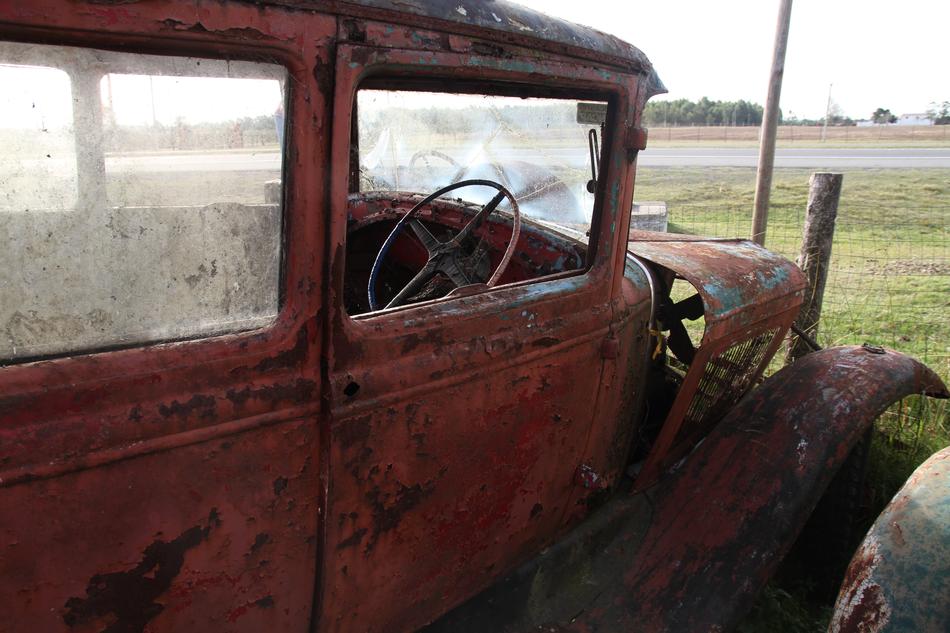 rusty car forgotten