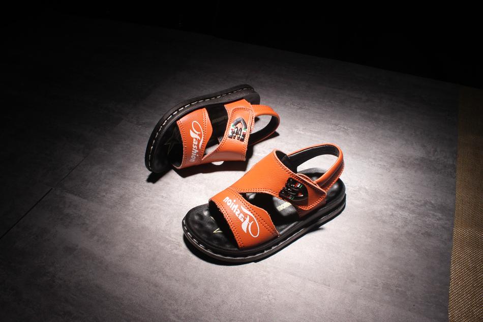 kids sneakers on the floor