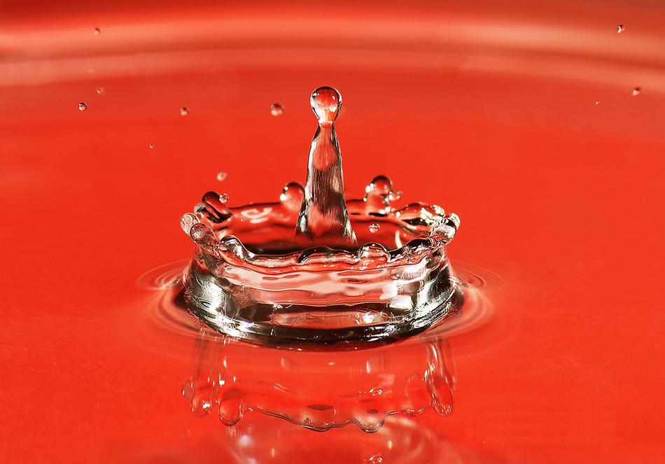 water drop on a red background