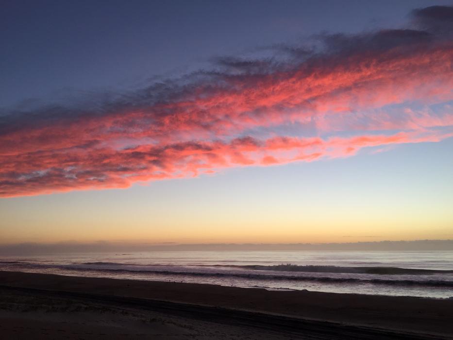 red clouds overlooking the sea