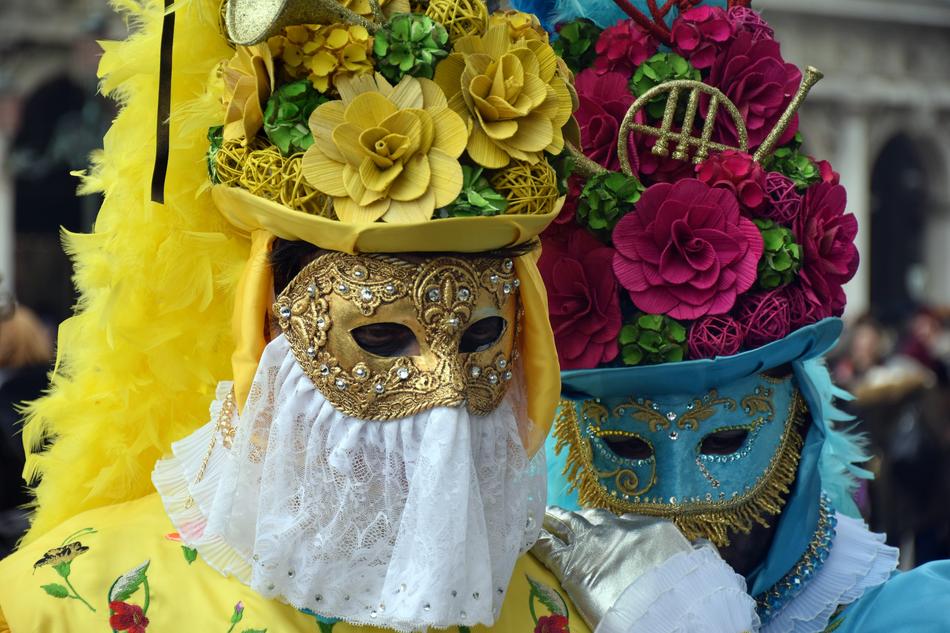 people in costumes and carnival masks