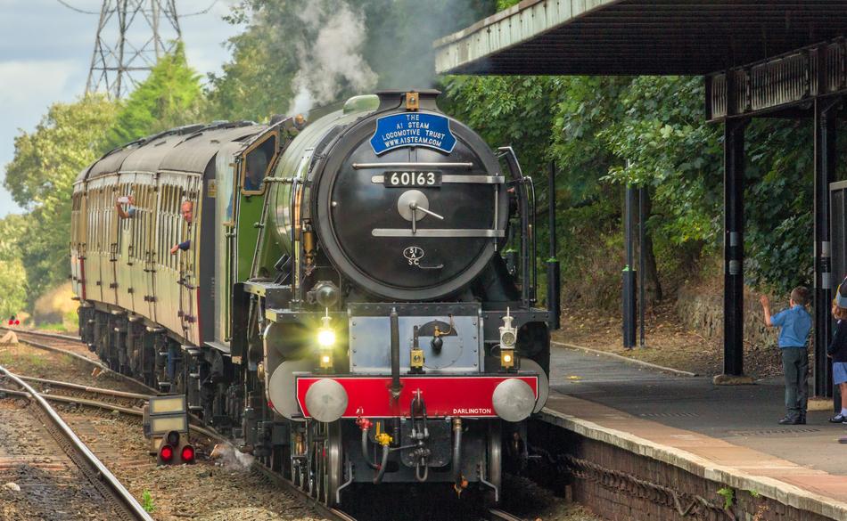 black train at a stop