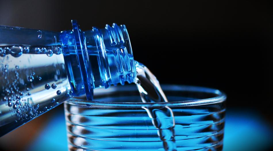 glass and water bottle blue