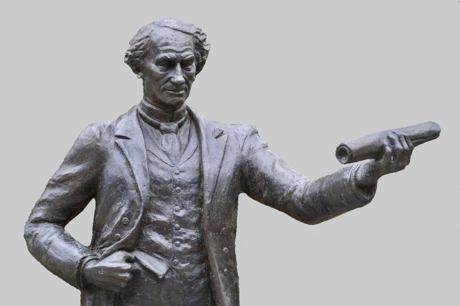 man sculpture grey