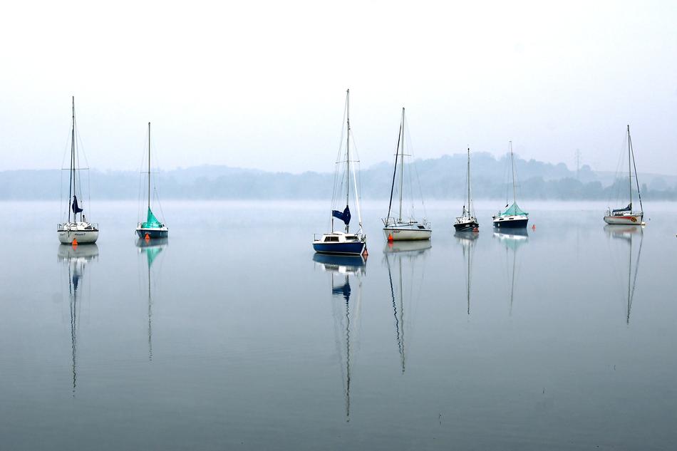 fishing boats in beautiful lake