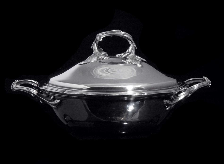 silver pot on a black background