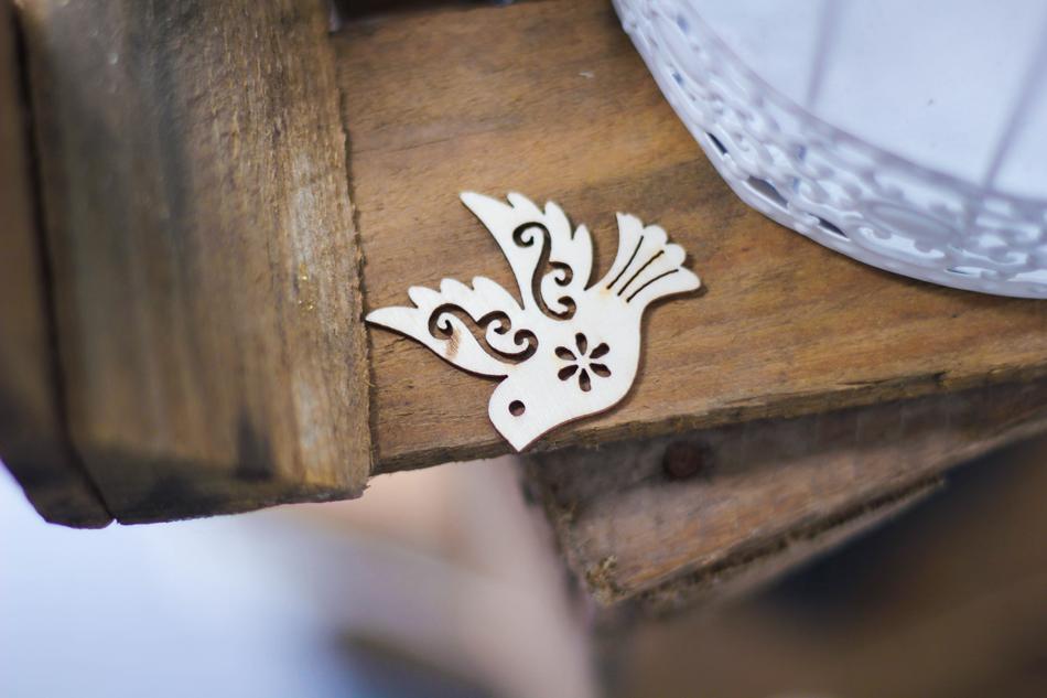 wooden bird on the table