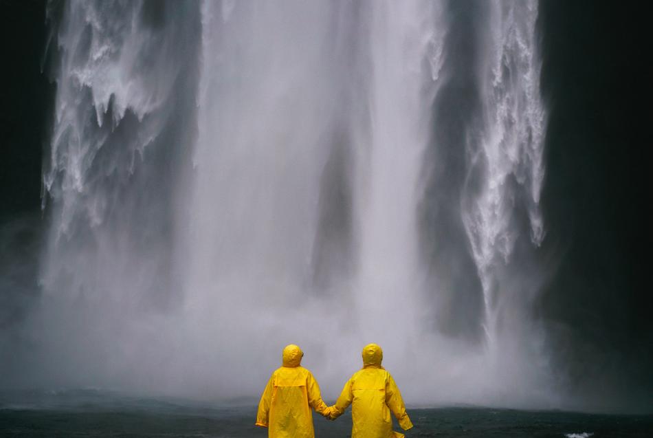 Couple Holding Hands and water all
