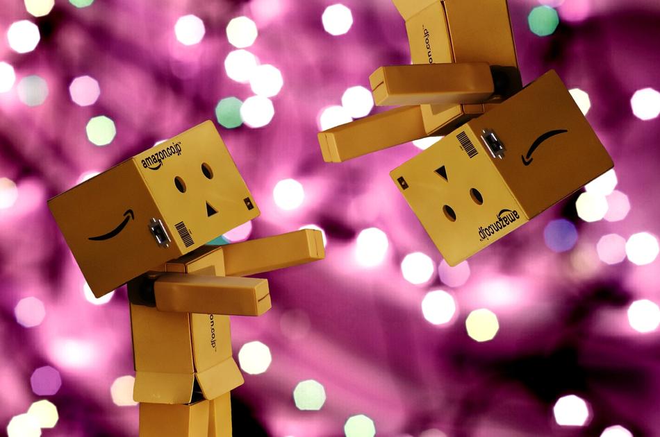 cardboard figures on purple.