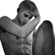 young man thinking, sculpture