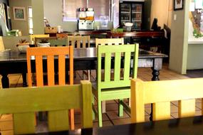 colored wooden chairs