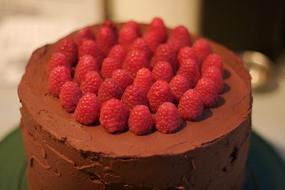 Chocolate cake decorated with raspberries